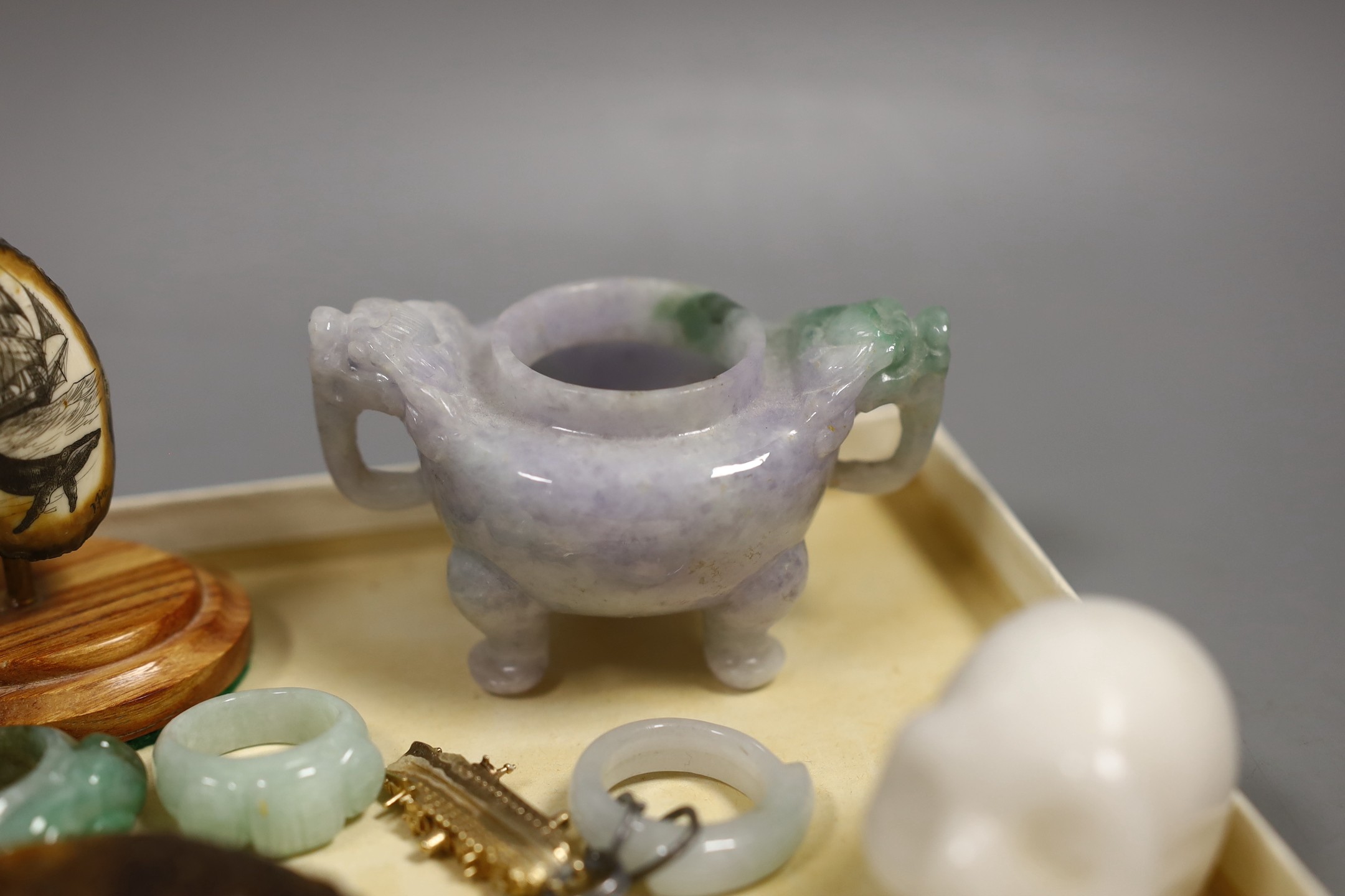 A group of Chinese jadeite rings, a censer and other carvings